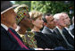 Mrs. Laura Bush listens to participants during a celebration of World Refugee Day Friday, June 20, 2008, in the East Garden of the White House. The event acknowledged the compassion of the American people in welcoming refugees into U.S. society and highlighting their contributions. White House photo by Shealah Craighead
