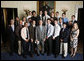 President George W. Bush stands with members of the Pennsylvania State University Men's Volleyball team on Tuesday, June 24, 2008, in the Blue Room of the White House during a photo opportunity with the 2007 and 2008 NCAA Sports Champions. White House photo by Eric Draper