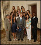 President George W. Bush stands with members of the UCLA Women's Tennis team, Tuesday, June 24, 2008, during a photo opportunity with the 2007 and 2008 NCAA Sports Champions. White House photo by Eric Draper
