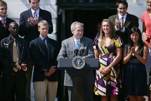 President George W. Bush is applauded as he addresses his remarks to athletes, their family members and invited guests Tuesday, June 24, 2008 at the White House, in honor of the 2007 and 2008 NCAA Sports Champions. White House photo by Luke Sharrett