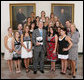 President George W. Bush stands with members of the University of Georgia Women's Gymnastics team, Tuesday, June 24, 2008, during a photo opportunity with the 2007 and 2008 NCAA Sports Champions at the White House. White House photo by Chris Greenberg