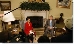 President George W. Bush welcomes President Gloria Macapagal-Arroyo of the Republic of the Philippines to the Oval Office Tuesday, June 24, 2008, at the White House. The President expressed deep condolences for those affected by Typhoon Fengshen saying, "We, the American people, care about the human suffering that's taking place, and we send our prayers." White House photo by Eric Draper