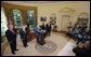 President George W. Bush delivers a brief statement Monday, June 30, 2008, at the White House after signing H.R. 2642, the Supplemental Appropriations Act, 2008. With him from left are: Deputy U.S. Secretary of State John Negroponte, U.S. Secretary of Defense Robert Gates, U.S. Secretary of Veterans' Affairs James Peake and John Walters, Director of the Office of National Drug Control Policy. The war supplemental spending package includes nearly $162 billion for the wars in Iraq and Afghanistan, increased education benefits for veterans, and an additional 13 weeks of unemployment insurance benefits. White House photo by Joyce N. Boghosian