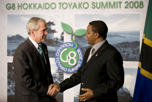 President George W. Bush and President Jakaya Kikwete exchange handshakes Monday, July 7, 2008, after meeting the media in Toyako, Japan, following the G-8 Working Session with the Africa Outreach Representatives. White House photo by Eric Draper