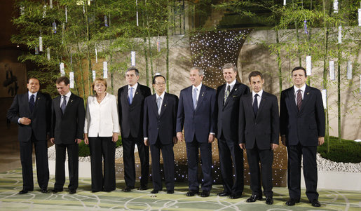 Leaders of Group of Eight pose for photos Monday, July 7, 2008, prior to dinner at the Windsor Hotel Toya Resort and Spa in Toyako, Japan. From left are: Prime Minister Silvio Berlusconi of Italy; President Dmitriy Medvedev of Russia; Chancellor Angela Merkel of Germany; Prime Minister Gordon Brown of the United Kingdom; Japan's Prime Minister Yasuo Fukuda; President George W. Bush; Prime Minister Stephen Harper of Canada; President Nicolas Sarkozy of France, and President Jose Manuel Barroso of the European Commission. White House photo by Eric Draper
