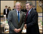 President George W. Bush and Prime Minister Gordon Brown of the United Kingdom, share a moment Tuesday, July 8, 2008, prior to the morning's G-8 Working Session at the Windsor Hotel Toya Resort and Spa in Toyako, Japan. White House photo by Eric Draper