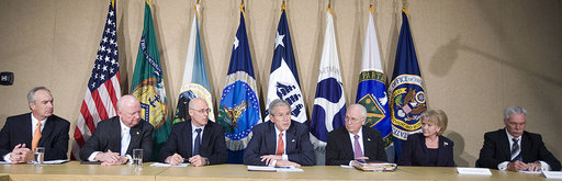 President George W. Bush sits with members of his economic team Friday, July 11, 2008, during a meeting at the U.S. Department of Energy. From left are: Secretary Dirk Kempthorne of the Department of the Interior; Secretary Samuel Bodman of the Department of Energy; Secretary Henry Paulson of the Department of Treasury; President Bush, Vice President Dick Cheney, Secretary Mary Peters of the Department of Transportation, and Secretary Edward Schafer of the Department of Agriculture. White House photo by Joyce N. Boghosian