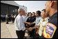 President George W. Bush, joined by California Governor Arnold Schwarzenegger, meets and thanks California public safety personnel Thursday, July 17, 2008 in Redding, Calif., for their efforts in battling the wildfires in Northern California. White House photo by Eric Draper