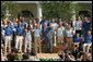 President George W. Bush joined by the members of the 2008 United States Summer Olympic Team wave to the crowd during a photo opportunity Monday, July 21, 2008, in the Rose Garden of the White House. White House photo by Shealah Craighead