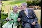President George W. Bush wishes Ruth Harris a happy 91st birthday Tuesday, July 29, 2008, after making a surprise stop at her Gates Mill, Ohio, home. President Bush was in nearby Euclid, Ohio, for a visit to the Lincoln Electric Company. White House photo by Chris Greenberg