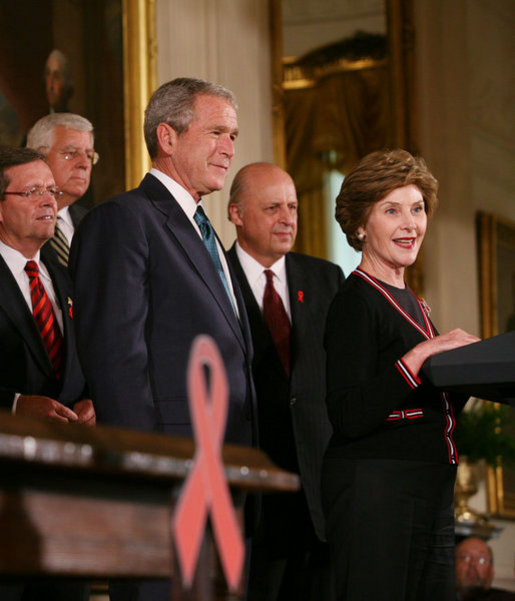 President George W. Bush is introduced to the podium by Mrs. Laura Bush Wednesday, July 30, 2008 in the East Room of the White House, prior to signing H.R. 5501, the Tom Lantos and Henry J. Hyde United States Global Leadership Against HIV/AIDS, Tuberculosis and Malaria Reauthorization Act of 2008. White House photo by Joyce N. Boghosian