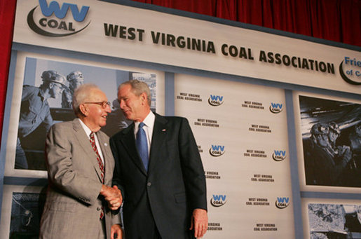 President George W. Bush greets Buck Harless, Chairman of the Board of International Industries Incorporated, Thursday, July 31, 2008 at the 2008 Annual Meeting of the West Virginia Coal Association in White Sulphur Springs, W.Va. White House photo by Joyce N. Boghosian