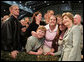 Mrs. Laura Bush joins members of the audience for photos Monday, Aug. 4, 2008, after remarks by President George W. Bush at Eielson Air Force Base, Alaska. White House photo by Shealah Craighead