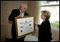 Mrs. Lynne Cheney is presented the National Society of the Sons of the American Revolution (NSSAR) Distinguished Patriot Award by Timothy R. Bennett, NSSAR Registrar General, Wednesday, July 30, 2008, at the Vice President's Residence at the Naval Observatory in Washington, D.C. White House photo by David Bohrer