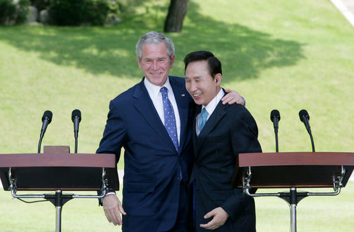 President George W. Bush embraces South Korean President Lee Myung-bak at the conclusion of their joint news conference Wednesday, Aug. 6, 2008, at the Blue House presidential residence in Seoul, South Korea. White House photo by Chris Greenberg