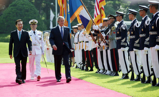 President George W. Bush, joined by South Korean President Lee Myung-bak, reviews an honor guard Wednesday, Aug. 6, 2008, at the Blue House presidential residence in Seoul. White House photo by Shealah Craighead