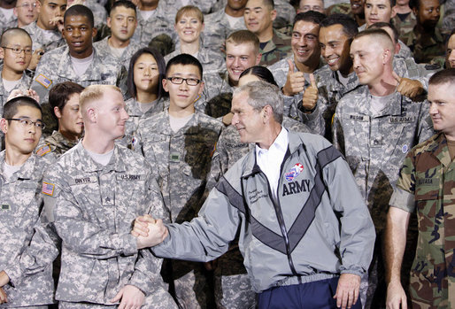 President George W. Bush shakes hands with one of the many personnel he met following his remarks at the U.S. Army Garrison-Yongsan Wednesday, August 6, 2008, in Seoul, South Korea. White House photo by Eric Draper