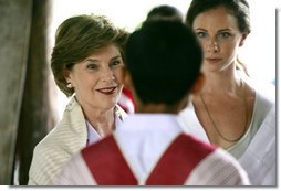 Mrs. Laura Bush and daughter Ms. Barbara Bush, right, visit a grammar class at the Mae La Refugee Camp at Mae Sot, Thailand, on August 7, 2008. At least 39,000 Burmese have gathered at this camp to escape oppression in their country. The camp is the largest of nine refugee camps in Thailand. White House photo by Shealah Craighead