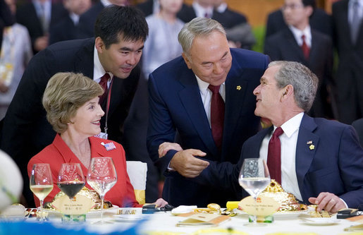 President George W. Bush greets President Nursultan Nazabayev of Kazakhstan Friday, Aug. 8, 2008, during a social luncheon in Beijing honoring the 2008 Olympic Summer Games. White House photo by Eric Draper