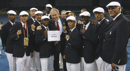 President George W. Bush poses for photos with members of the United States Olympic Boxing Team Friday, Aug. 8, 2008, before the Opening Ceremony of the 2008 Summer Olympic Games in Beijing. White House photo by Eric Draper