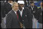 President George W. Bush stands with Danielle Scott-Arruda, a member of the U.S. Olympic Volleyball team, as he meets with the athletes Friday, Aug. 8, 2008, prior to the start of the Opening Ceremony of the 2008 Summer Olympic Games in Beijing. White House photo by Eric Draper