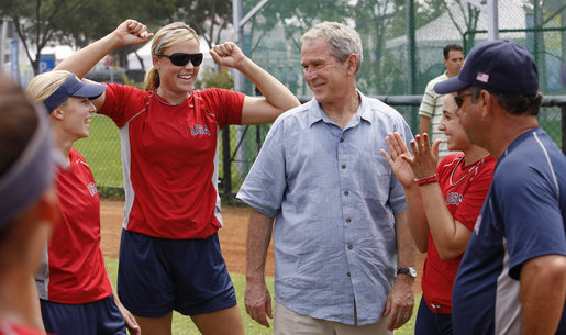 President George W. Bush visits with the U.S. Women's Softball team Saturday, Aug. 9, 2008, at their Beijing practice field at Fengtai Complex. Calling the team the "Gold Medal Champs," the President said, "It's good for the world to have girls playing softball and these women are going to show girls how to win." White House photo by Eric Draper
