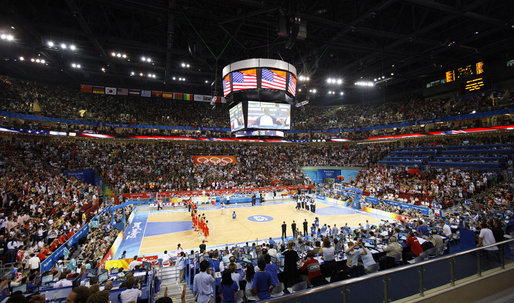 Members of the U.S. and China's men's Olympic basketball teams line up on the court prior to their game Sunday, Aug. 10, 2008, at the 2008 Summer Olympic Games in Beijing. White House photo by Eric Draper