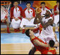 U.S. Olympic Men's Basketball team member LeBron James goes up for shot against China's Yao Ming Sunday, Aug. 10, 2008, during action in the Group B men's Olympic basketball game between the U.S. and China, at the 2008 Summer Olympic Games in Beijing. White House photo by Eric Draper