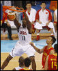 U.S. Olympic Men's Basketball team member Dwight Howard makes a slam dunk Aug. 10, 2008, during action in the Group B men's Olympic basketball game between the U.S. and China, at the 2008 Summer Olympic Games in Beijing. White House photo by Eric Draper