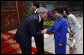 President George W. Bush shakes hands with Madame Liu Yongquig, wife of China's President Hu Jintao, following President Bush's visit and meeting Sunday, Aug. 10, 2008, to Zhongnanhai, the Chinese leaders compound in Beijing. White House photo by Eric Draper