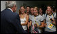 President George W. Bush greets members of the U.S. Olympic Swimming Team Sunday, Aug. 10, 2008, backstage at the National Aquatics Center in Beijing. White House photo by Shealah Craighead