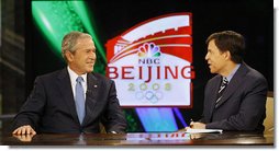 President George W. Bush speaks with Bob Costas of NBC Sports during an interview Monday, Aug. 11, 2008, while attending the 2008 Summer Olympic Games in Beijing.  White House photo by Eric Draper