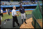 President George W. Bush meets with U.S. Olympic men's baseball team player Dexter Fowler of Alpharetta, Ga., while attending a practice game between the U.S. and the Chinese Olympic men's baseball teams Monday, Aug. 11, 2008, at the 2008 Summer Olympic Games in Beijing. White House photo by Eric Draper