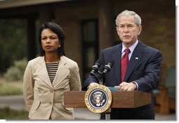 President George W. Bush delivers a statement on the situation in Georgia with Secretary of State Condoleezza Rice in Crawford, Texas, Saturday, Aug. 16, 2008. White House photo by Eric Draper