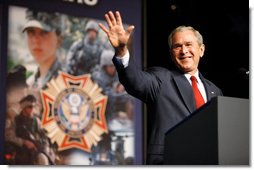 President George W. Bush waves as he acknowledges the applause from the audience at his address Wednesday, Aug. 20, 2008, to the Veterans of Foreign Wars National Convention in Orlando, Fla. President Bush thanked the members of the VFW for their work on behalf of America's veterans and their support in fighting the war on terror.  White House photo by Eric Draper