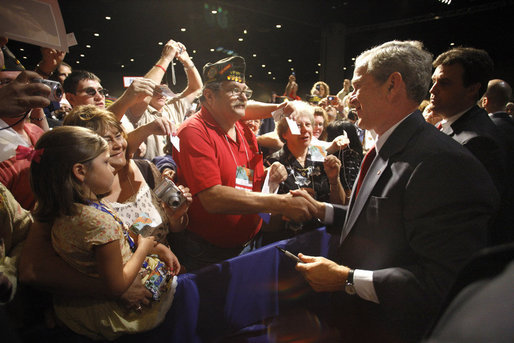 President George W. Bush greets members of the Veterans of Foreign Wars and their family members following his address Wednesday, Aug. 20, 2008, at the VFW National Convention in Orlando, Fla., where President Bush thanked the members of the VFW for their work on behalf of America's veterans. White House photo by Eric Draper