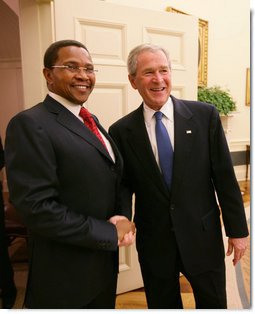President George W. Bush welcomes Tanzania President Jakaya Kikwete to the Oval Office Friday, Aug. 29, 2008, where the two leaders held discussions on their bilateral relations. President Bush also thanked President Kikwete for his gracious hospitality during the President and Mrs. Bush's visit to Tanzania early this year in February.  White House photo by Chris Greenberg