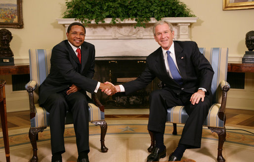 President George W. Bush shakes hands with Tanzania President Jakaya Kikwete in the Oval Office at the White House Friday, Aug. 29, 2008, during their meeting with reporters. White House photo by Chris Greenberg