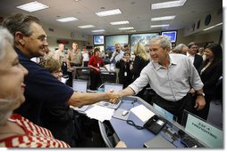 President George W. Bush greets and thanks personnel at the Emergency Operations Center in Austin, Texas, Monday, Sept. 1, 2008, following a briefing update on Hurricane Gustav. White House photo by Eric Draper