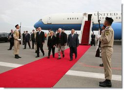 Vice President Dick Cheney and Mrs. Lynne Cheney are escorted by First Deputy Prime Minister of Azerbaijan Mr. Yagub Eyyubov, right, upon their arrival to Heydar Aliyev International Airport Wednesday, Sept. 3, 2008, in Baku, Azerbaijan. The visit to Baku is the first stop on a multi-day trip to the Caucasus region followed by visits to Ukraine and Italy.  White House photo by David Bohrer
