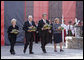 Vice President Dick Cheney is joined by Mrs. Lynne Cheney, President of Ukraine Viktor Yushchenko and Mrs. Kateryna Yushchenko, in presenting memorial baskets Friday, Sept. 5, 2008, at the Holodomar Memorial at St. Michael's Square in Kyiv. The Holodomar, Ukraine's famine of 1932-33, was imposed by Soviet communists and killed an estimated three to seven million. White House photo by David Bohrer