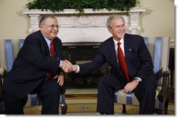 President George W. Bush welcomes Iraqi President Jalal Talabani to the Oval Office, Wednesday, Sept. 10, 2008, where the two leaders heralded the improved security situation and quality of life for the citizens of Iraq.  White House photo by Eric Draper