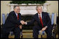 President George W. Bush welcomes Iraqi President Jalal Talabani to the Oval Office, Wednesday, Sept. 10, 2008, where the two leaders heralded the improved security situation and quality of life for the citizens of Iraq.  White House photo by Eric Draper