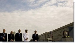 President George W. Bush is joined from left by former Secretary of Defense Donald Rumsfeld, U.S. Secretary of Defense Robert Gates, Chairman of the Joint Chiefs of Staff, Admiral Michael Mullen and James J. Laychak, chairman of the Pentagon Memorial Fund, Inc. as they bow their heads during a Moment of Silence Thursday, Sept. 11, 2008, at the dedication of the 9/11 Pentagon Memorial at the Pentagon in Arlington, Va.  White House photo by Eric Draper