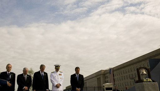 President George W. Bush is joined from left by former Secretary of Defense Donald Rumsfeld, U.S. Secretary of Defense Robert Gates, Chairman of the Joint Chiefs of Staff, Admiral Michael Mullen and James J. Laychak, chairman of the Pentagon Memorial Fund, Inc. as they bow their heads during a Moment of Silence Thursday, Sept. 11, 2008, at the dedication of the 9/11 Pentagon Memorial at the Pentagon in Arlington, Va. White House photo by Eric Draper