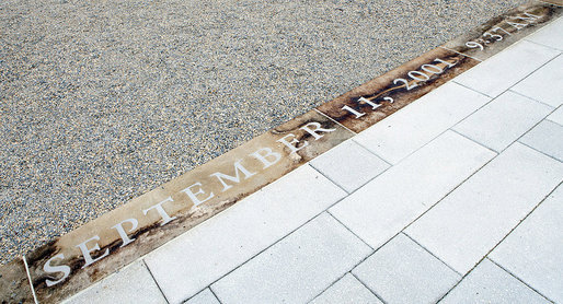 The date and time of September 11, 2001 9:37 AM is seen etched in the entry walkway to the 9/11 Pentagon Memorial Thursday, Sept. 11, 2008 at the Pentagon in Arlington, Va., where 184 memorial benches were unveiled honoring all innocent life lost when American Airlines Flight 77 crashed into the Pentagon. White House photo by Eric Draper