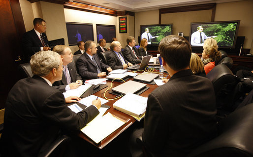 President George W. Bush is briefed on Hurricane Ike Thursday, Sept. 11, 2008, in the Situation Room of the White House. The massive storm is predicted to make landfall within the next 48 hours. White House photo by Eric Draper