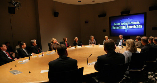 President George W. Bush participates in a roundtable discussion on Health Savings Accounts Friday Sept. 12, 2008, at the Presbyterian Health Foundation Conference Center in Oklahoma City. Said the President afterward, "I do want to thank you all very much for, one, being pioneers; two, being risk-takers; and three, giving me a chance to hear your thoughts and concerns and -- about a very innovative way for small businesses and individuals to be able to better afford health care." White House photo by Chris Greenberg