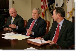 President George W. Bush is joined by Secretary of Energy Samuel Bodman, left, and FEMA Administrator David Paulison, right, as he speaks to the press from the Roosevelt Room following a briefing on the latest developments concerning Hurricane Ike, Sunday, Sept. 14, 2008. White House photo by Chris Greenberg