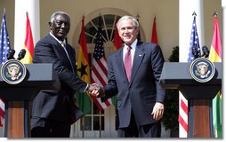 President George W. Bush shakes hands with President John Agyekum Kufuor of Ghana following a joint statement Monday, Sept. 15, 2008, in the Rose Garden of the White House. White House photo by Chris Greenberg